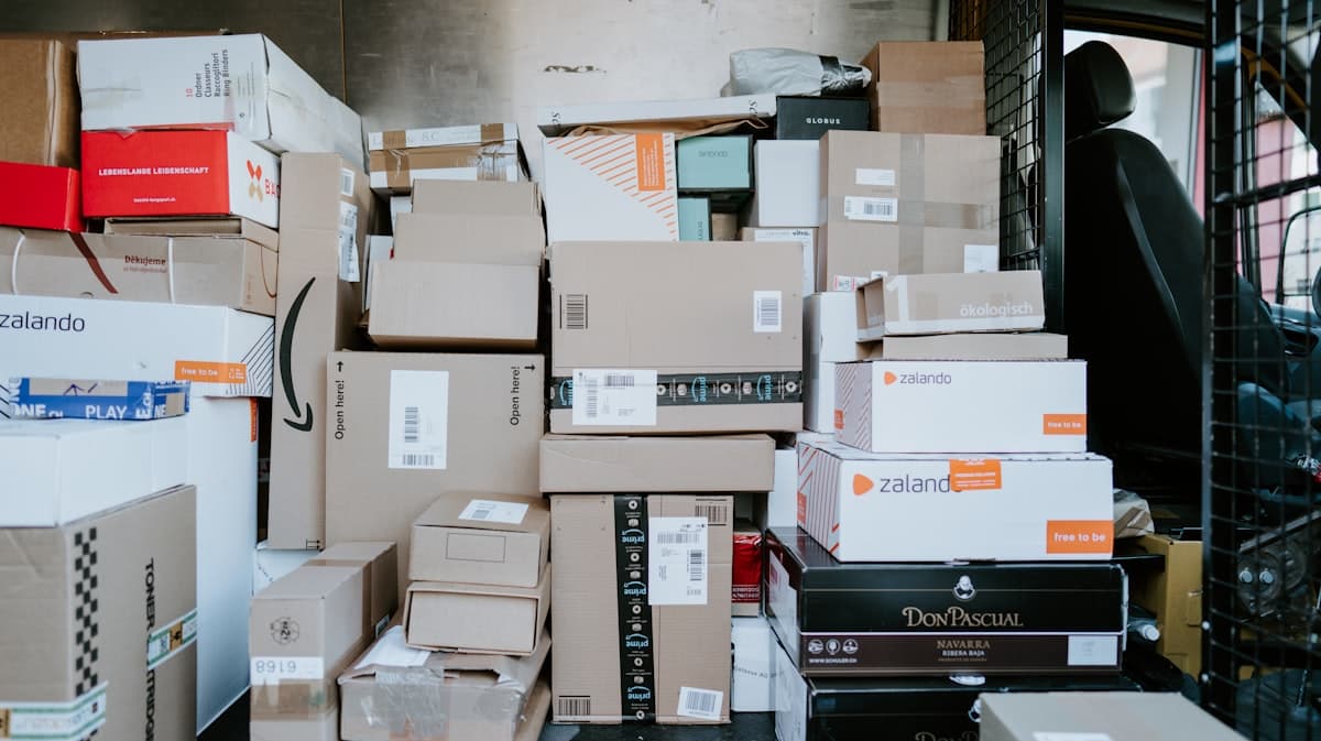 Multi-channel ecommerce returns processing workflow with grading stations and restocking routes