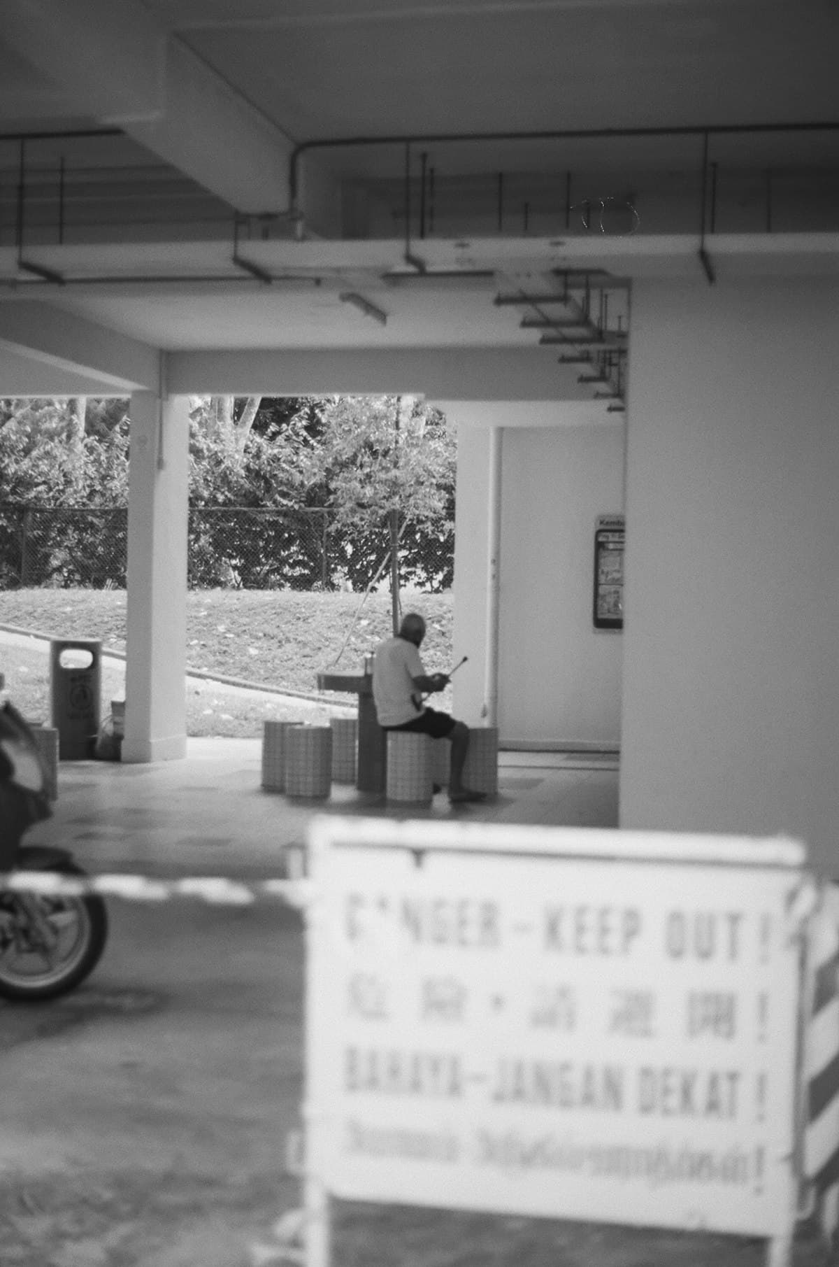 Warehouse worker scanning packages at a fulfillment packing station