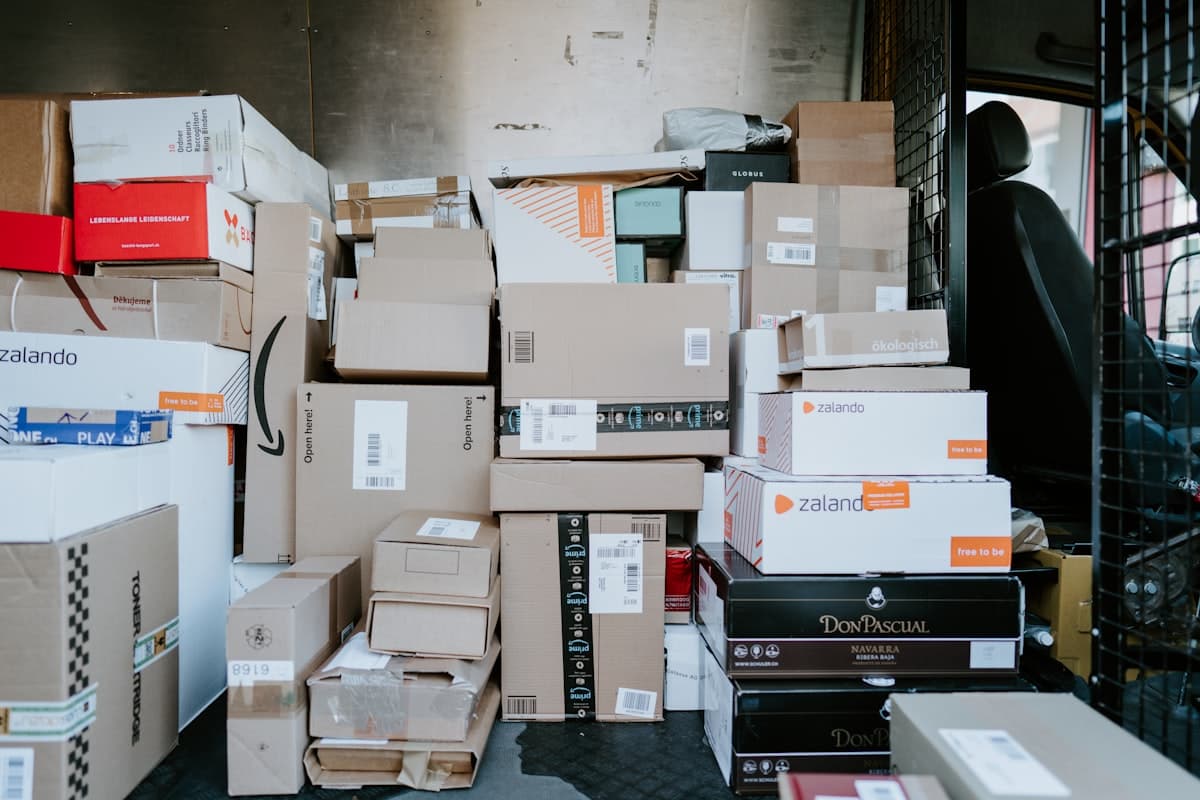 Ecommerce returns processing area with products being inspected and sorted for restock decisions